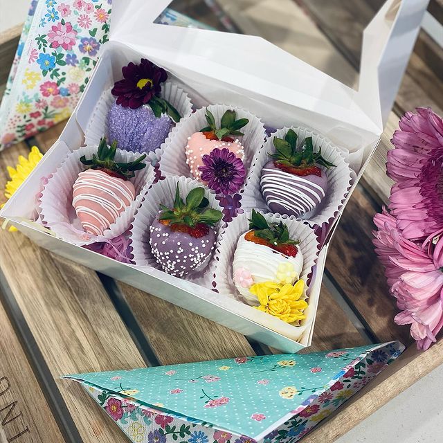 Colourful chocolate-covered strawberries